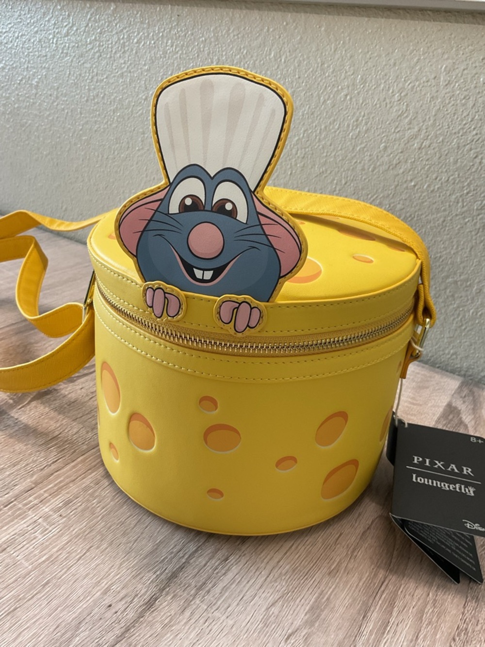 Loungefly Disney Ratatouille Remy Cheese Wheel Strawberry Scented Crossbody Bag - Picture 2 of 4
